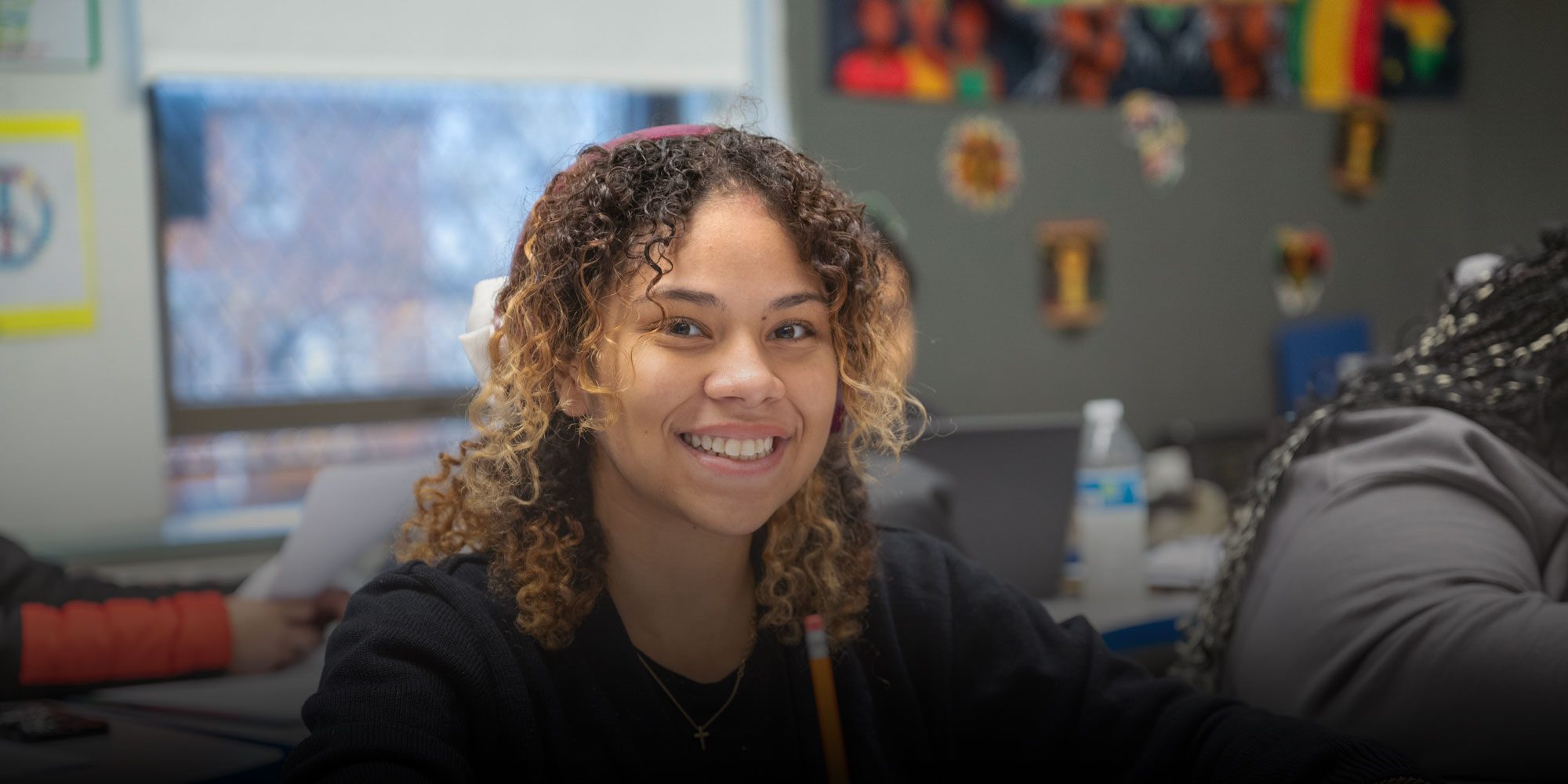 student working in classroom